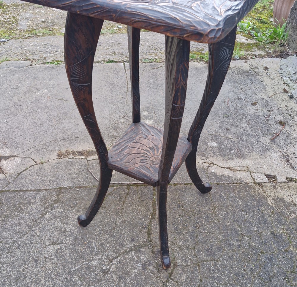 Carved Liberty's Japanese 2 tier table - used in the series 