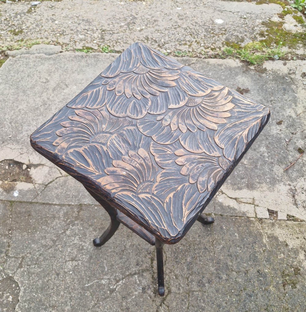 Carved Liberty's Japanese 2 tier table - used in the series 