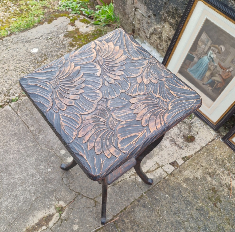 Carved Liberty's Japanese 2 tier table - used in the series 