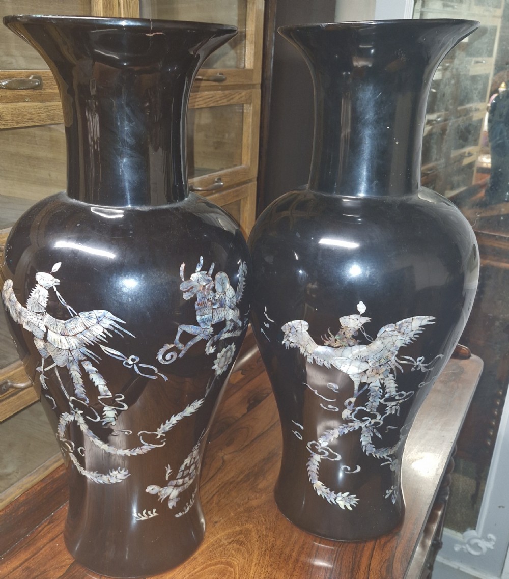 Pair mother of pearl inlaid lacquered on wood Japanese vases.