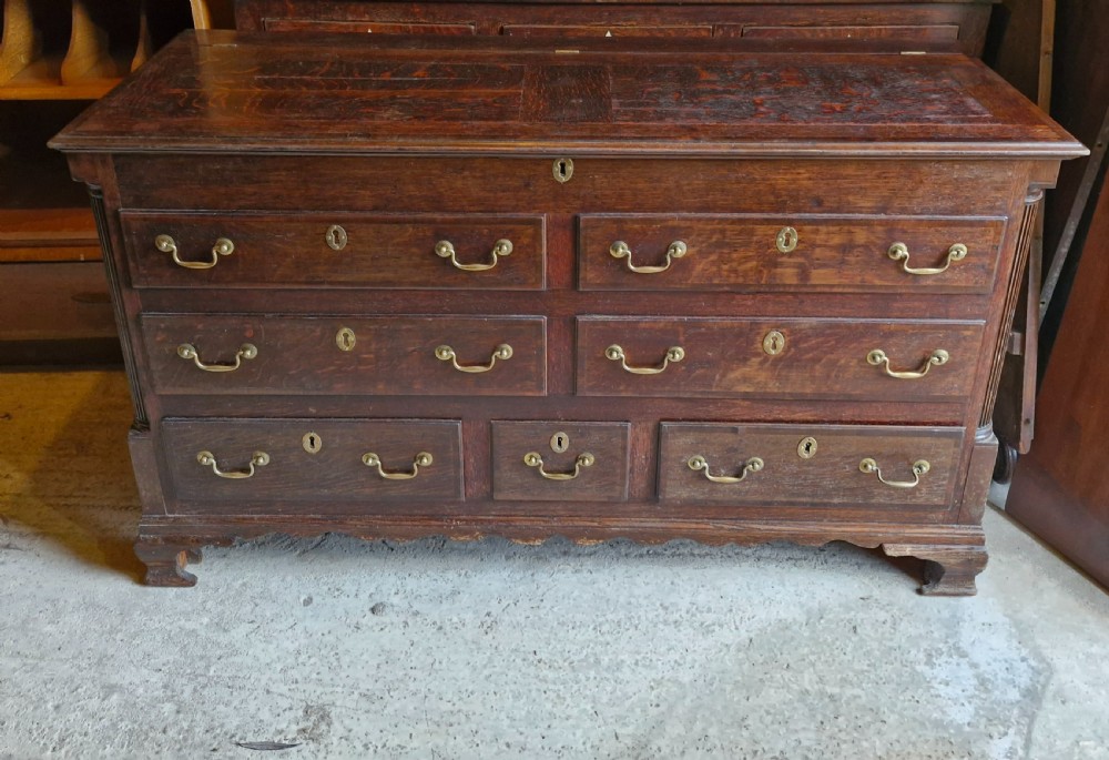 Early 19th oak and banded Lancashire mule chest.