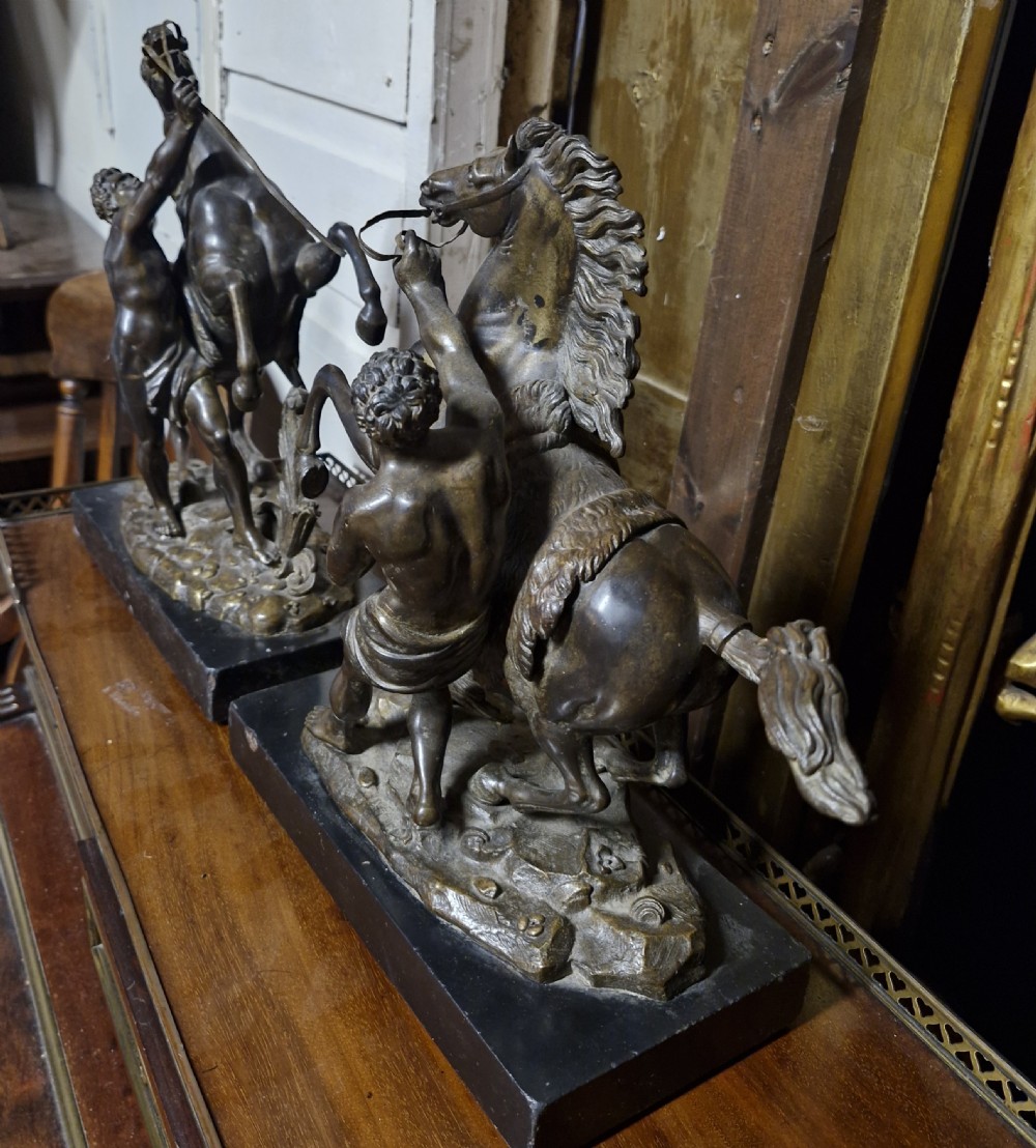 Pair of Bronzed Marley Horsemen.  View II