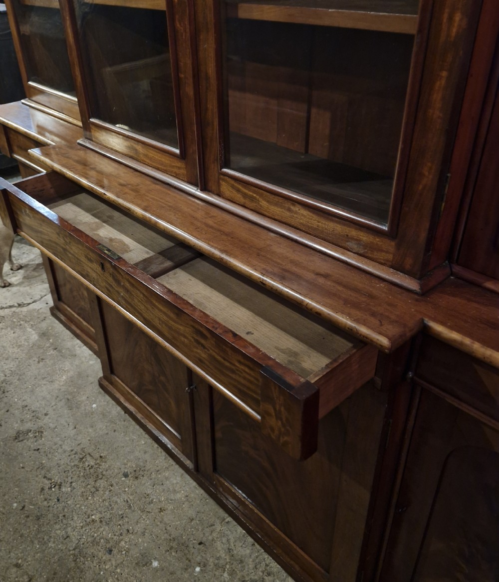 Mid 19th century mahogany breakfront bookcase of slim proportions.  View X