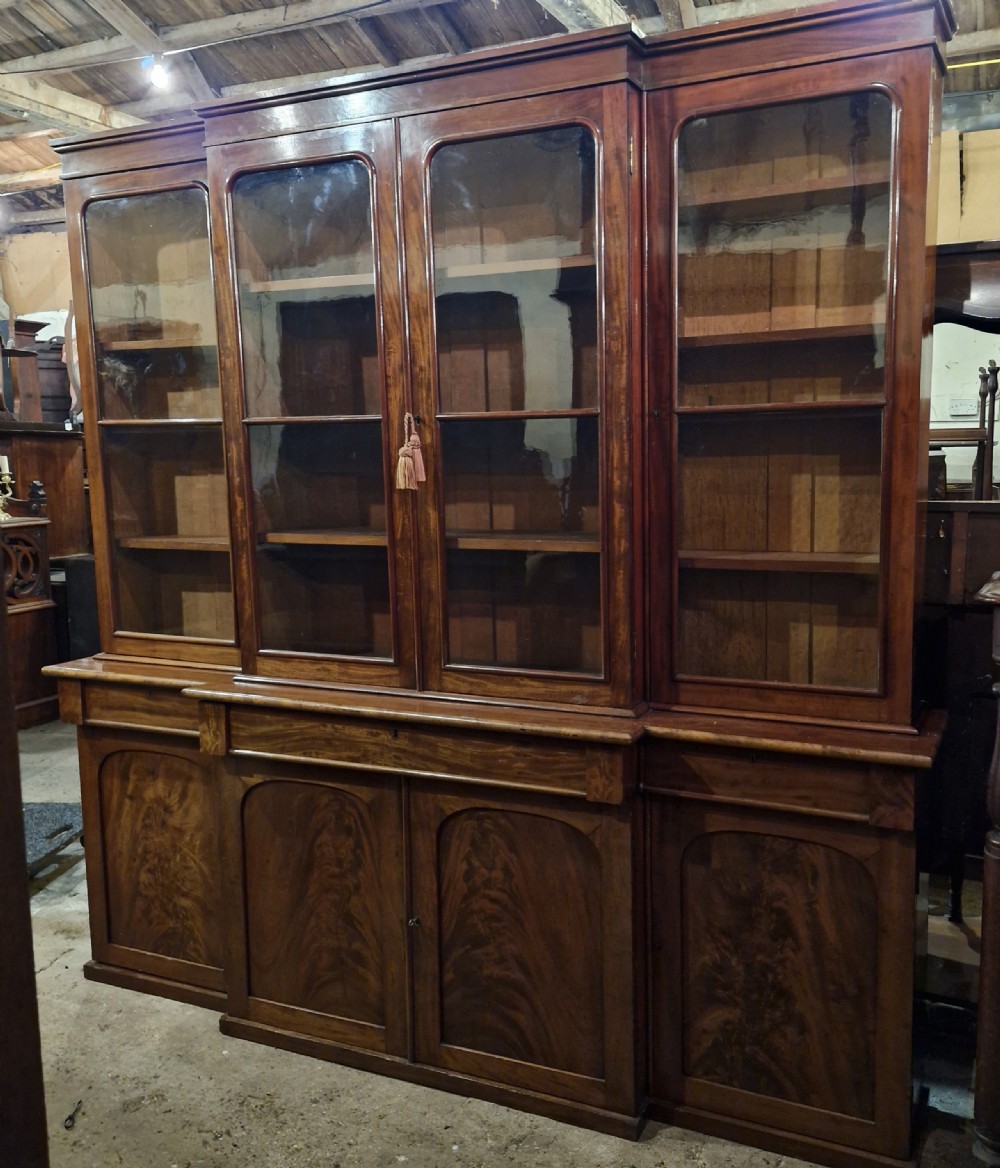 Mid 19th century mahogany breakfront bookcase of slim proportions.  View XI