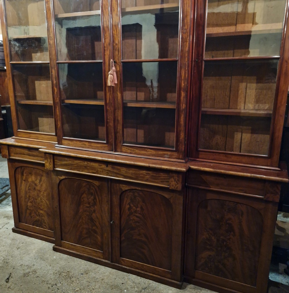 Mid 19th century mahogany breakfront bookcase of slim proportions.  View XIII