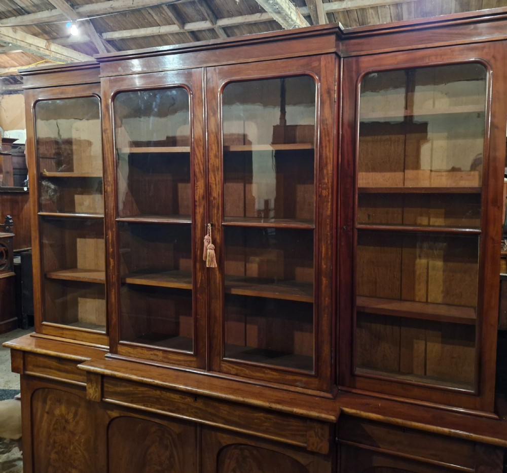 Mid 19th century mahogany breakfront bookcase of slim proportions.  View XV