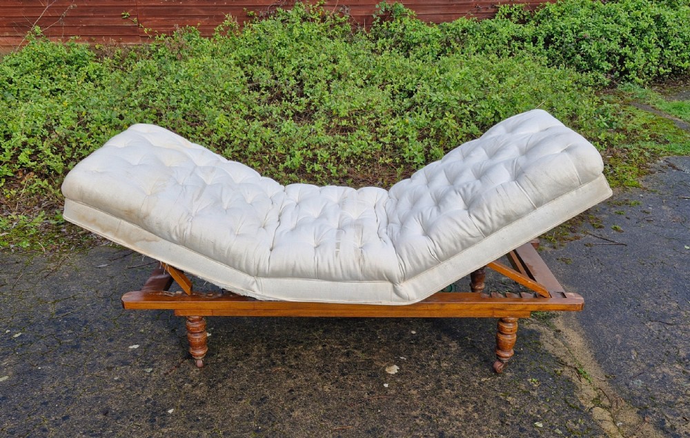 Late Victorian campaign bed or (large centre stool coffee table). View II