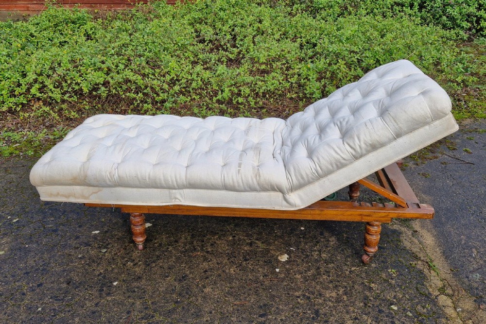 Late Victorian campaign bed or (large centre stool coffee table).