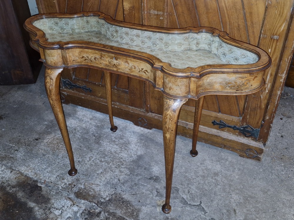 Pretty inlaid unusual shaped top walnut bijouterie display table.