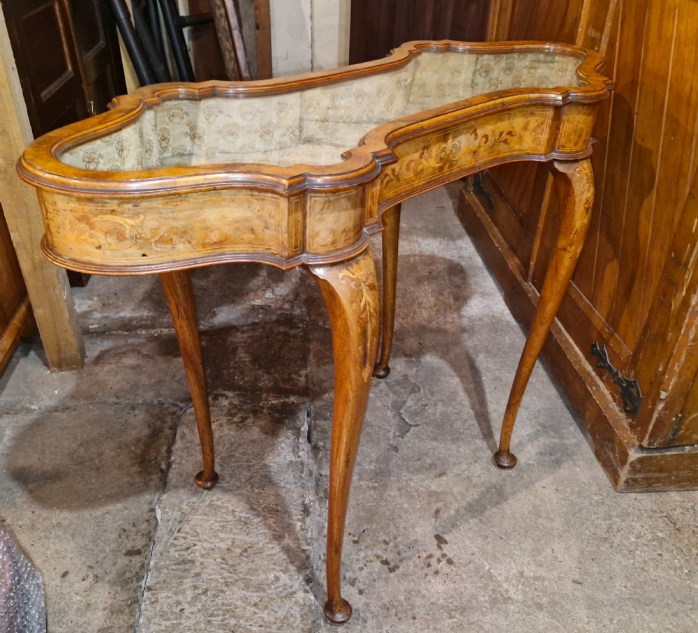 Pretty inlaid unusual shaped top walnut bijouterie display table. View V