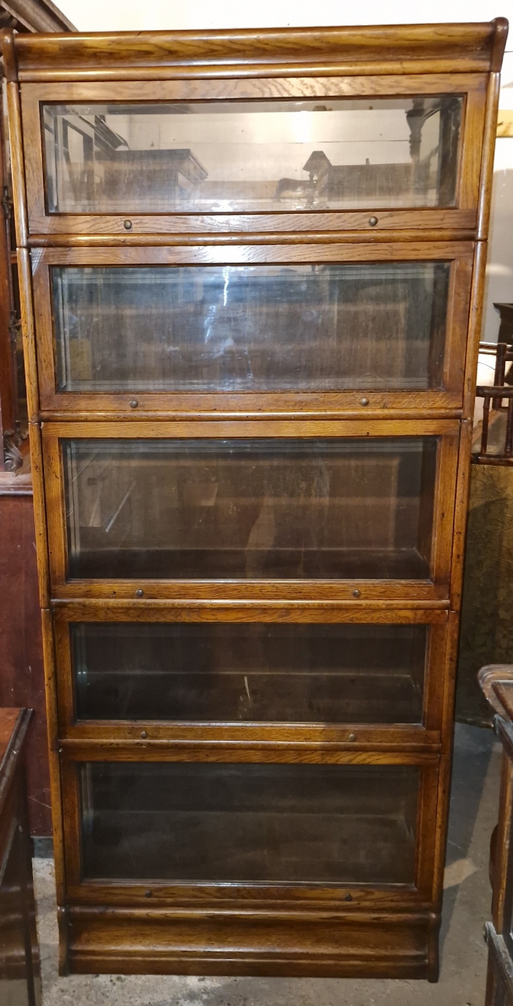 Oak glazed 5 door globe Wernicke design bookcase. 