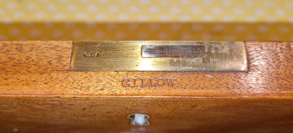 Good quality Satinbirch 2 part housekeepers cupboard.  Stamped Gillow.  View II