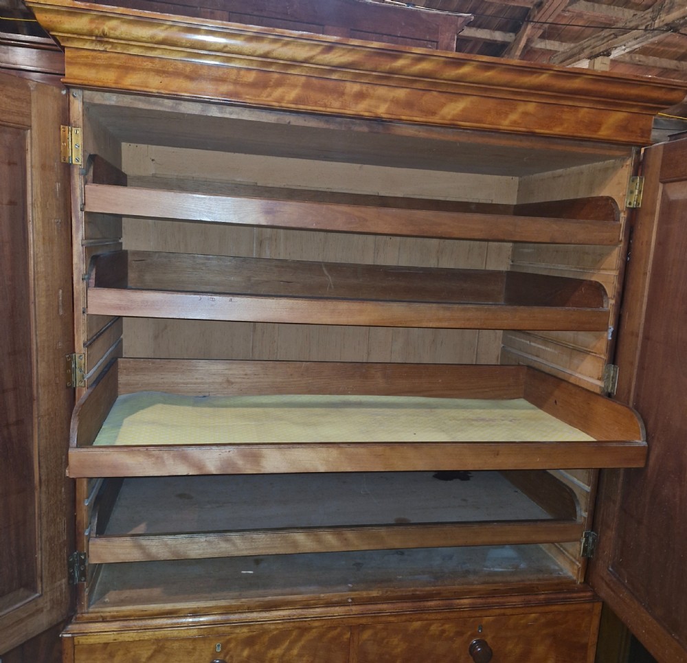 Good quality Satinbirch 2 part housekeepers cupboard.  Stamped Gillow.  View III