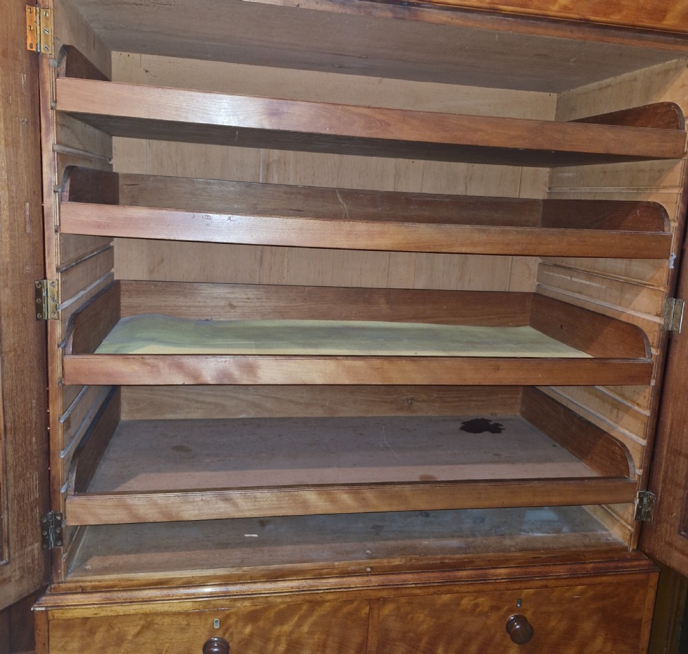 Good quality Satinbirch 2 part housekeepers cupboard.  Stamped Gillow.  View IV