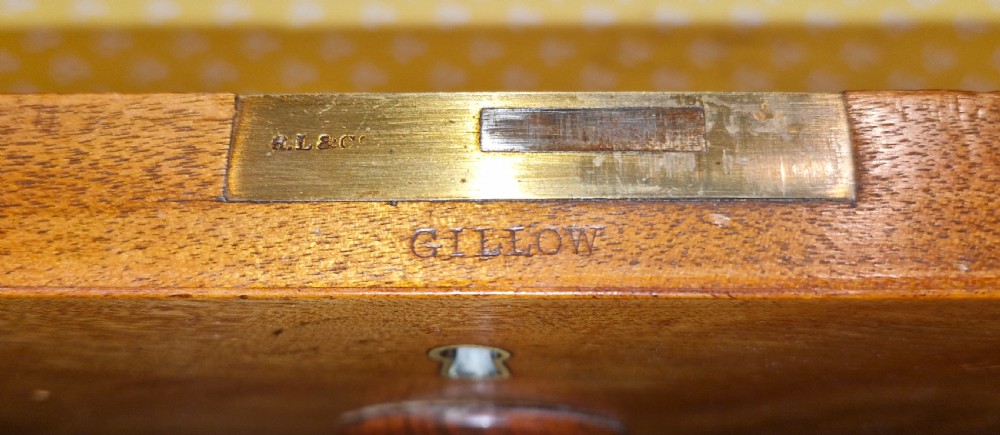 Good quality Satinbirch 2 part housekeepers cupboard.  Stamped Gillow.  View V