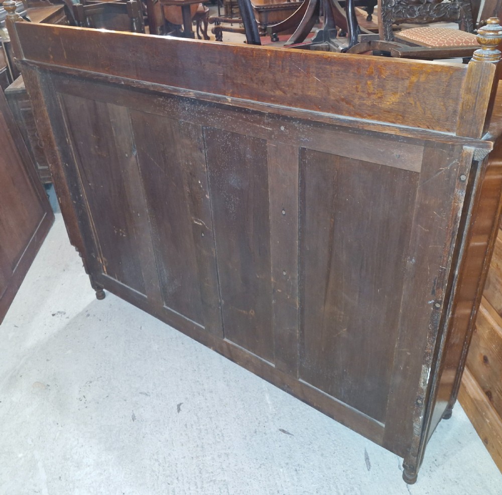 Neat late Victorian Gillows of Lancaster oak bookcase  View IV