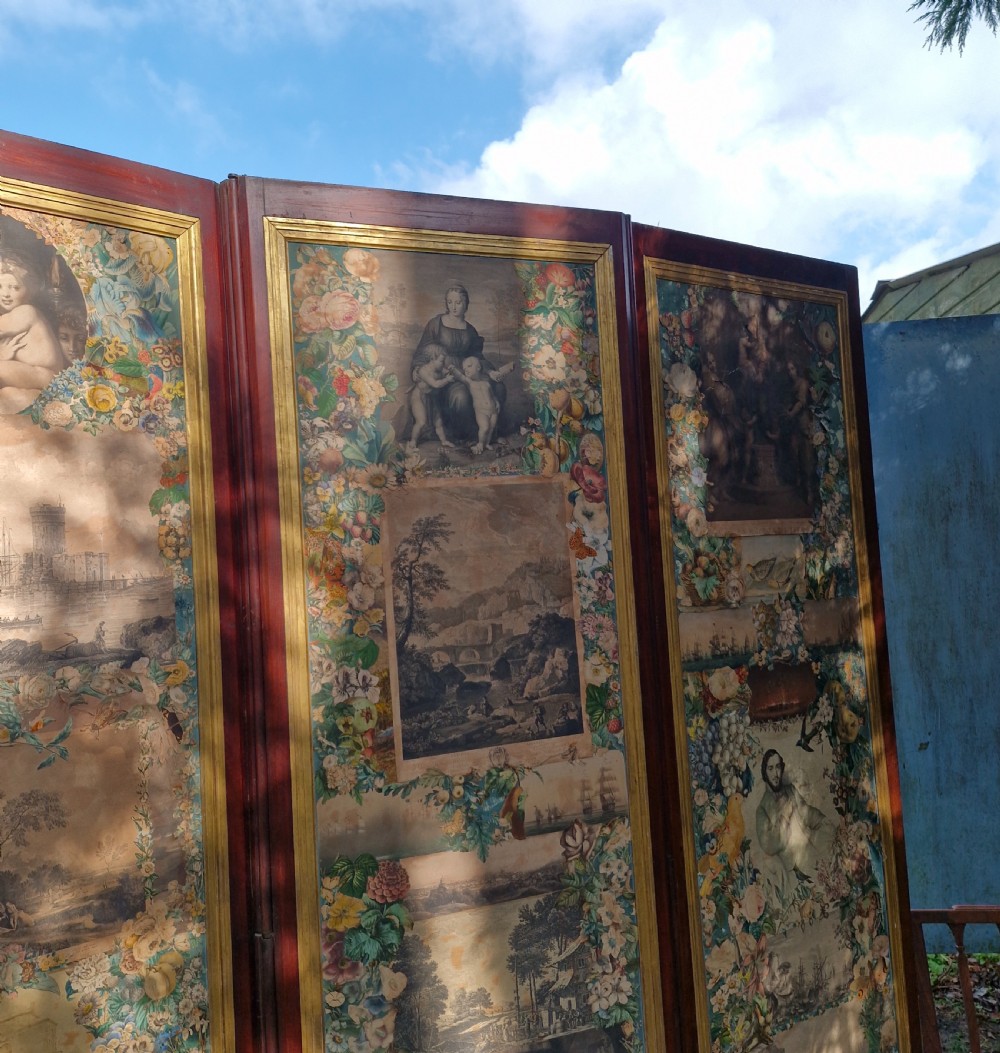 A mid-nineteenth-century four-fold mahogany draught screen featuring decoupage panels of classical prints and floral borders set within gilded inner frames. View XVIII
