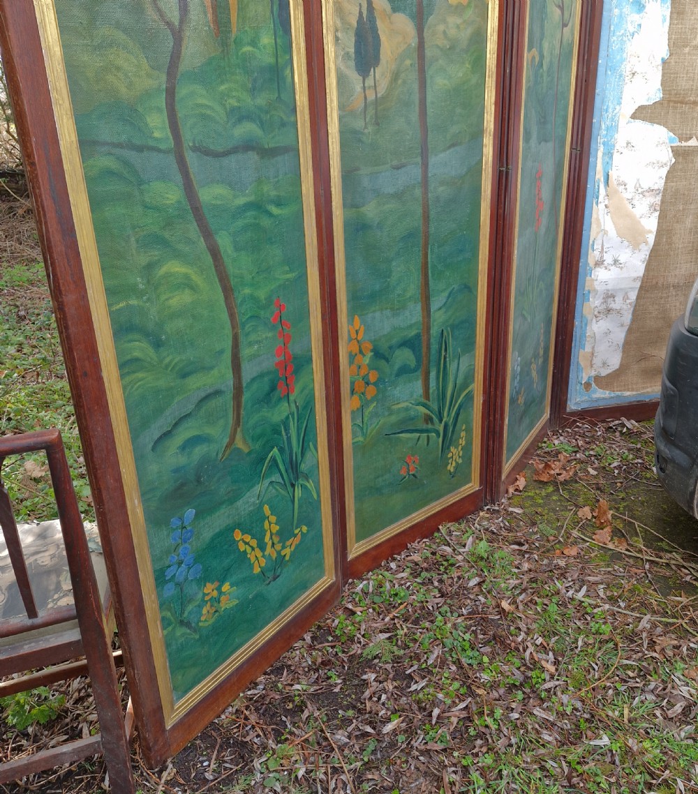 A mid-nineteenth-century four-fold mahogany draught screen featuring decoupage panels of classical prints and floral borders set within gilded inner frames. View XXIII