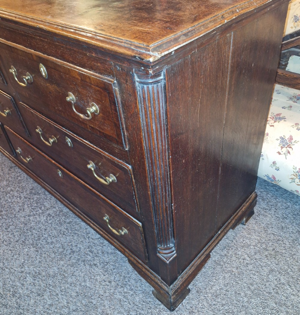 Late Georgian oak dresser base. View VIII