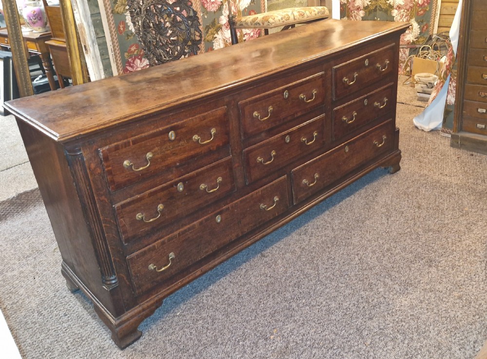 Late Georgian oak dresser base. View XI