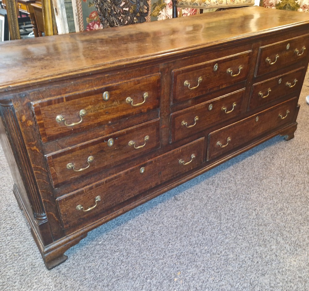 Late Georgian oak dresser base. View XII