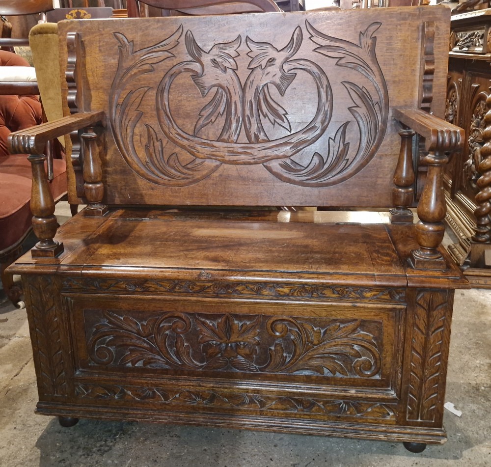 Late Victorian carved oak hall seat - Monks Bench.