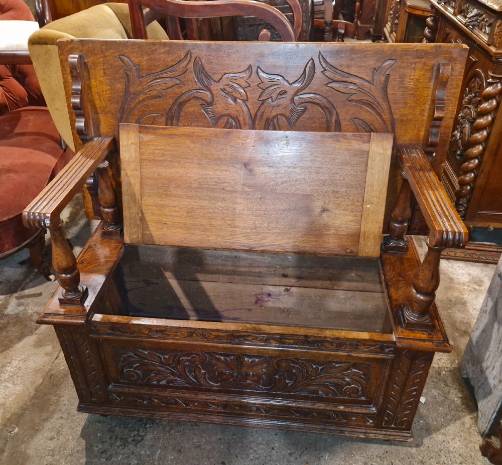 Late Victorian carved oak hall seat - Monks Bench. View VII
