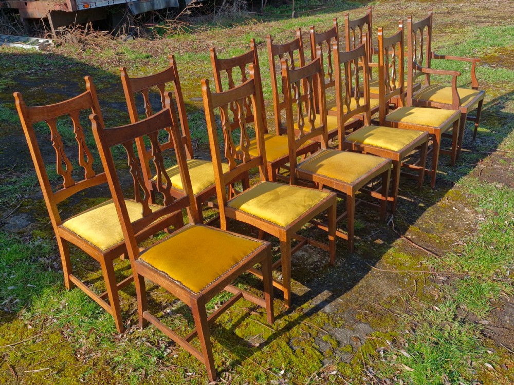 Set of 12 oak Arts and Crafts dining chairs.  View V
