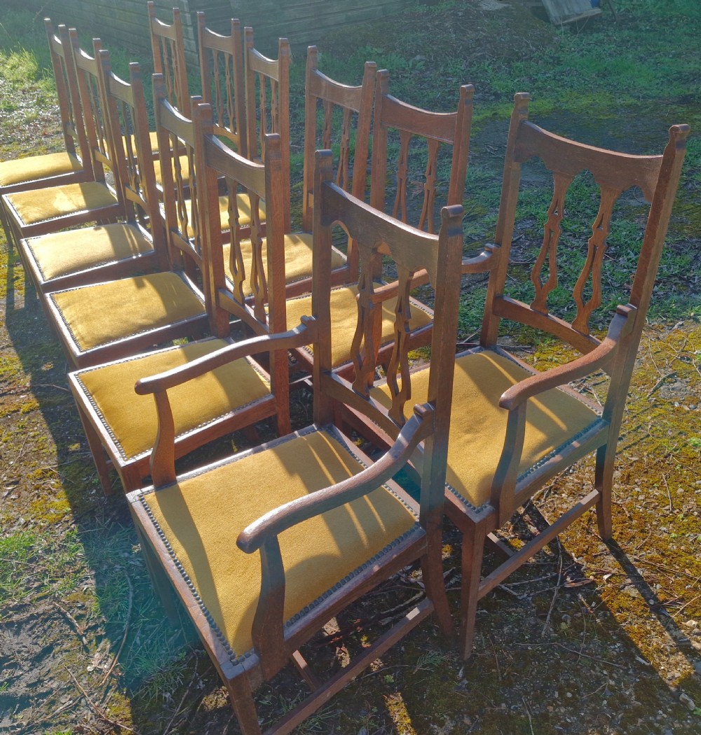 Set of 12 oak Arts and Crafts dining chairs.  View VI