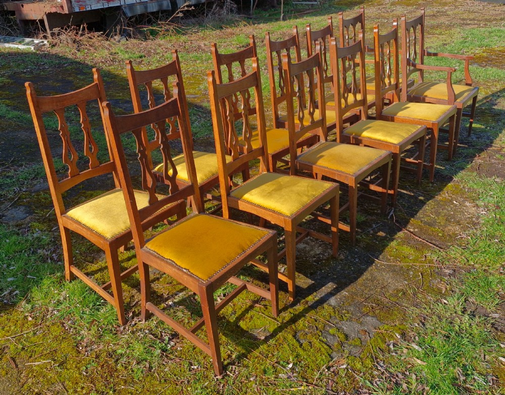 Set of 12 oak Arts and Crafts dining chairs.  View X