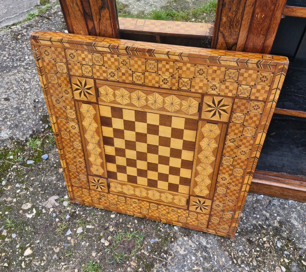 Late 19th century inlaid games table top.