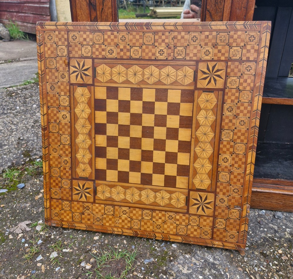 Late 19th century inlaid games table top. View VII