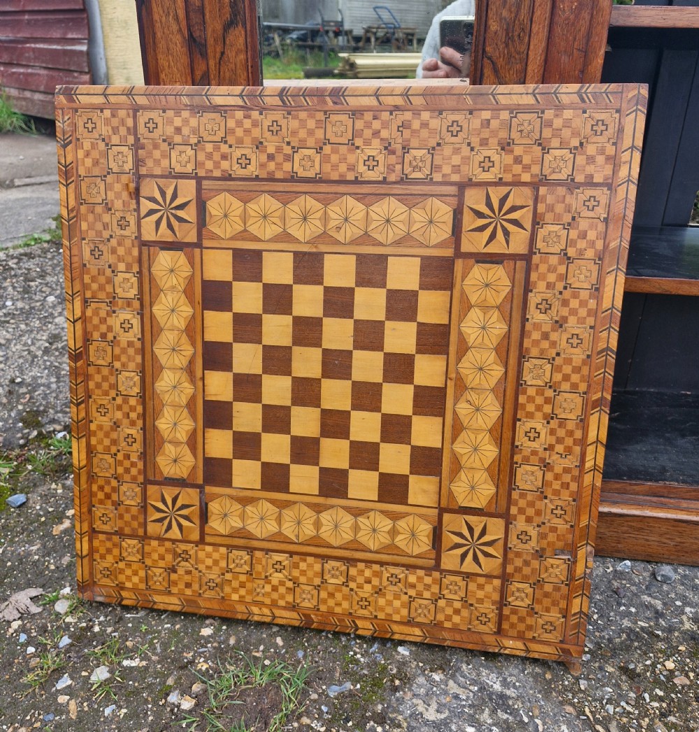 Late 19th century inlaid games table top. View VIII