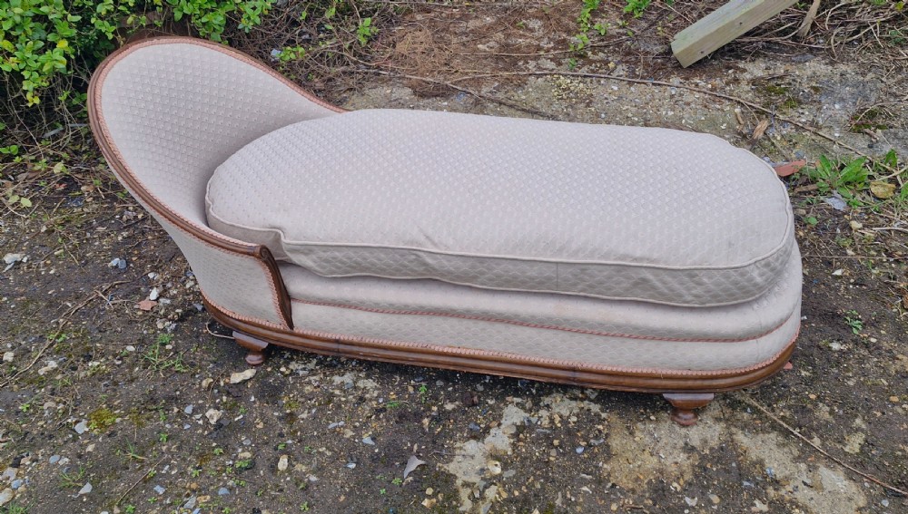 Early 20th century upholstered mahogany framed day bed. View II