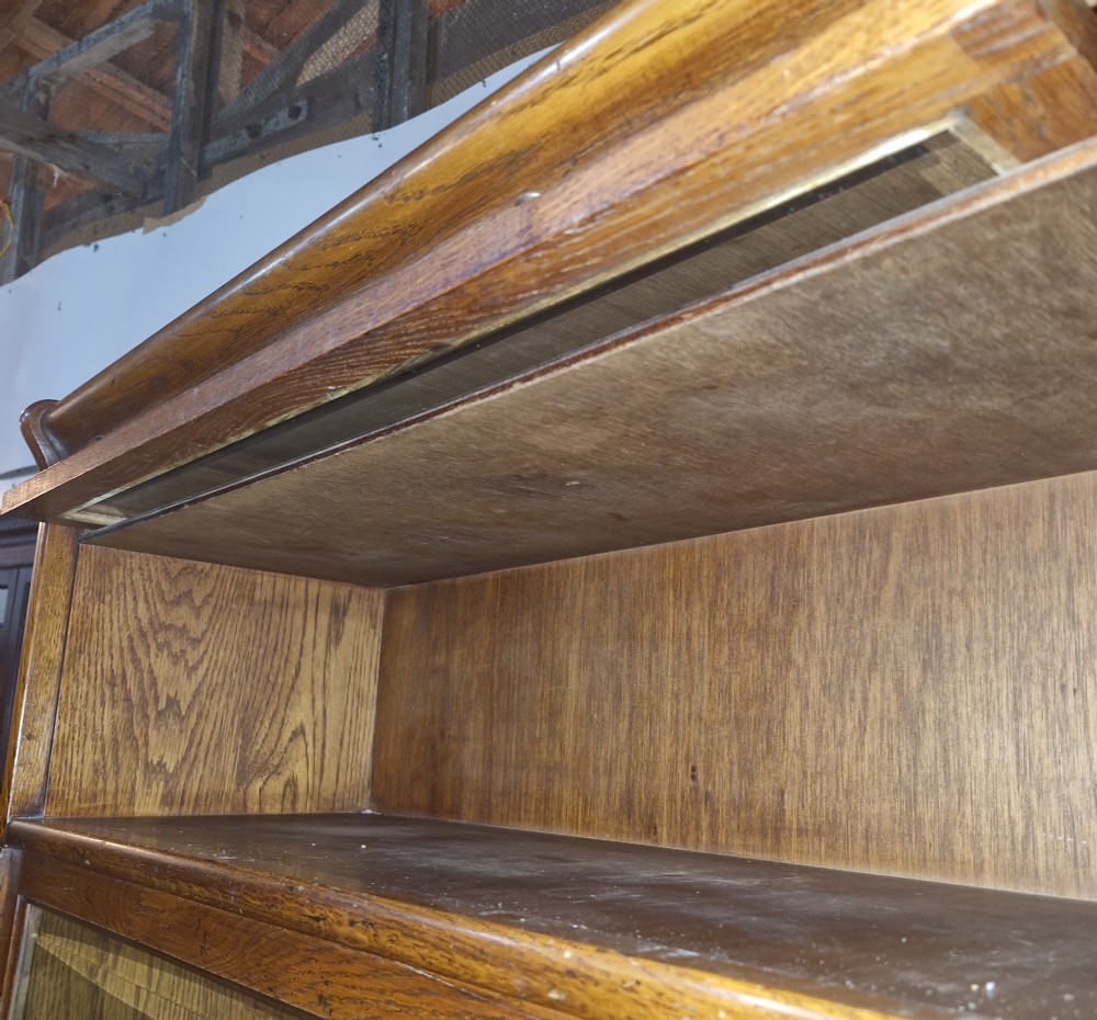 Oak glazed 5 door globe Wernicke design bookcase.  View VIII