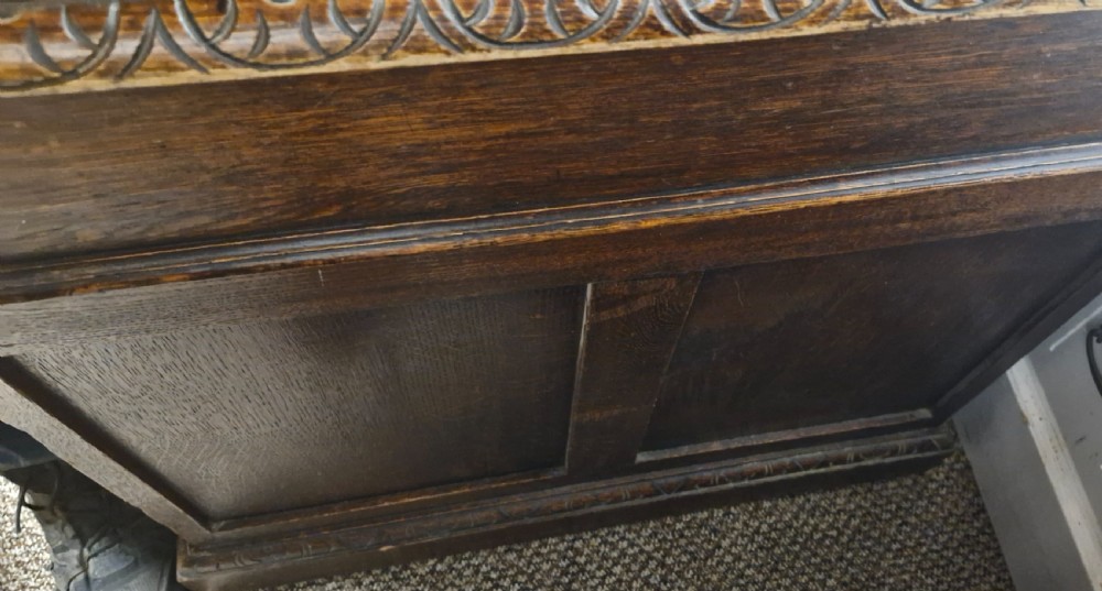 Late Victorian carved oak Greenman pedestal desk.  View IX