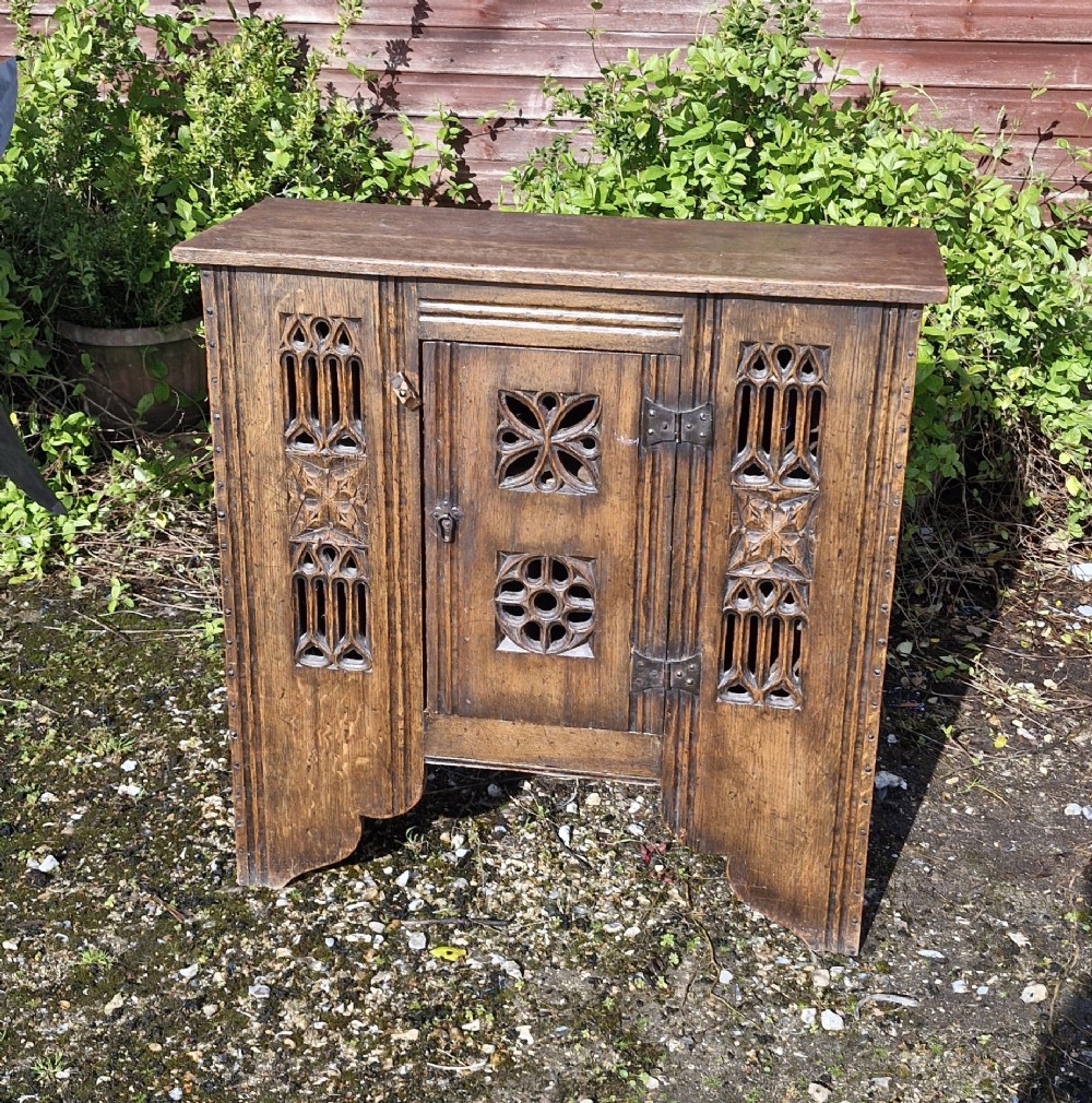 Good early 20th century Gothic oak Aumbry cupboard. 