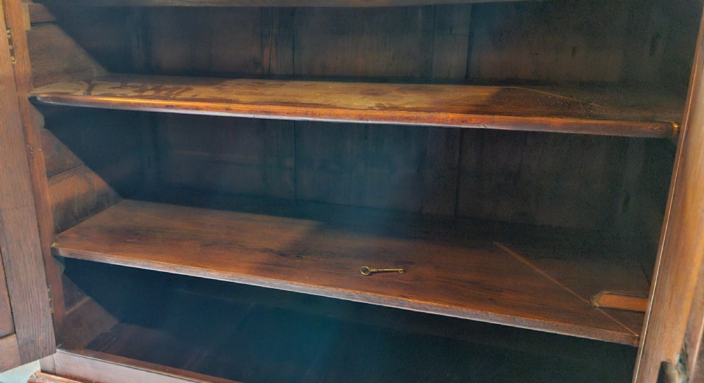 Late Georgian oak 2 part housekeepers cupboard.  View VI