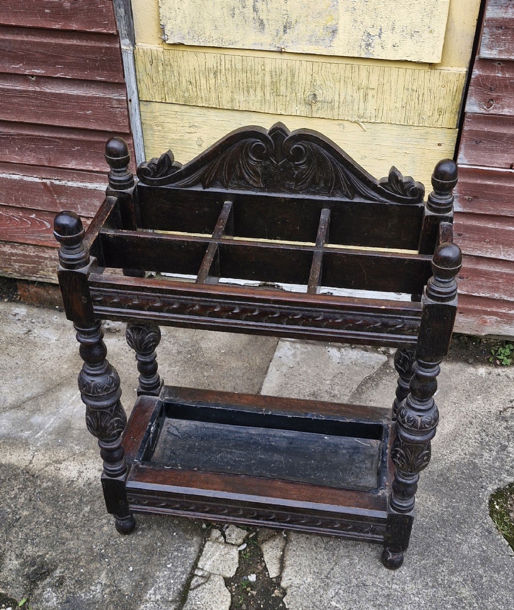 Late Victorian carved oak hallway umbrella and stick stand. 