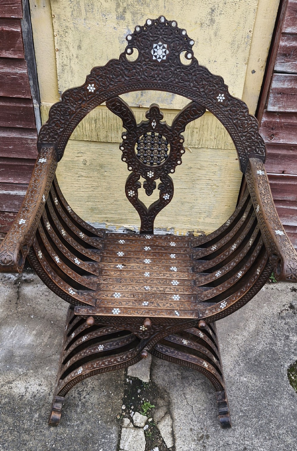 Late 19th century carved and inlaid Moorish armchair. 