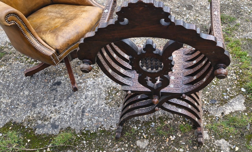 Late 19th century carved and inlaid Moorish armchair.  View IX