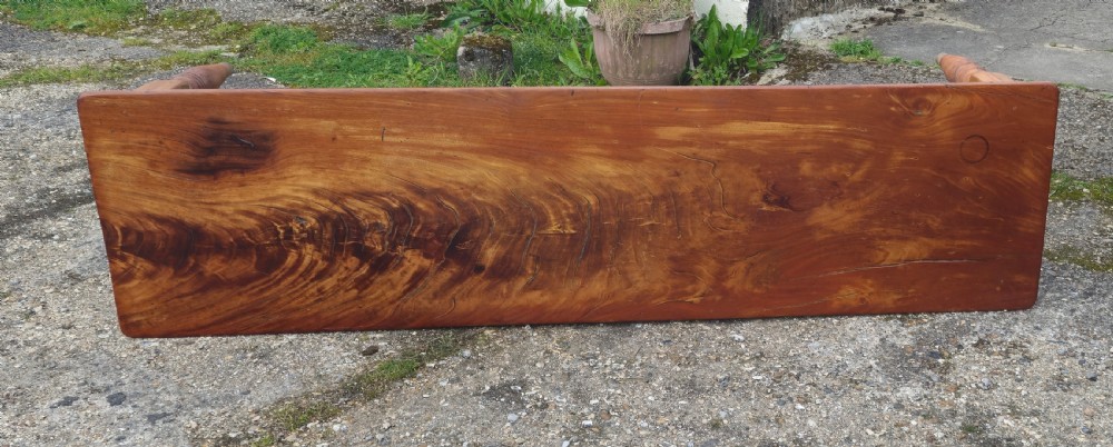 A long Victorian pine kitchen dining table featuring a single-board top with visible wood grain and four turned legs. View II