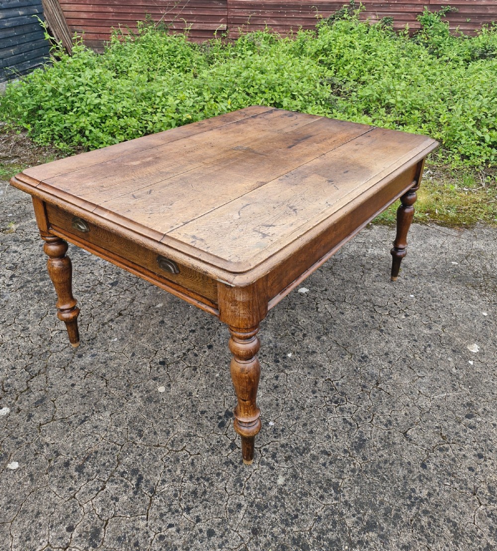 Late Victorian oak kitchen dining table.