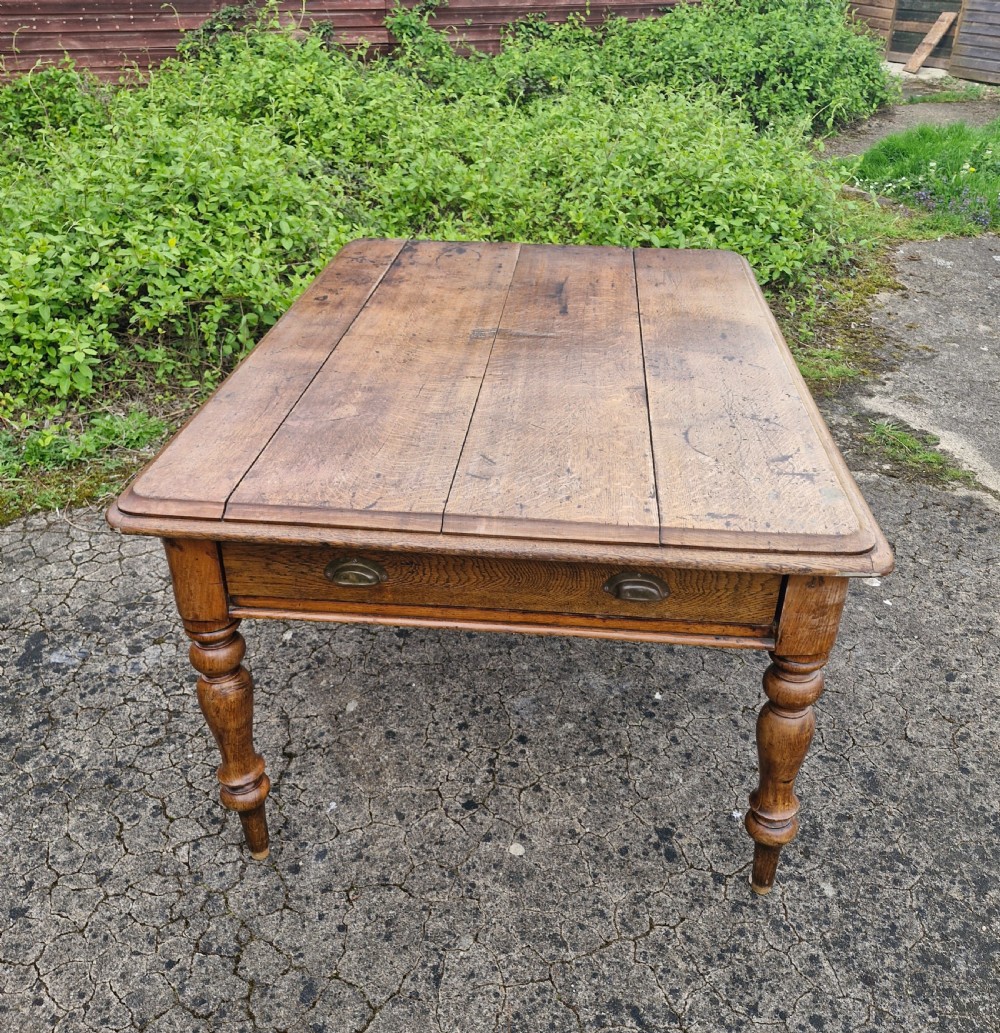 Late Victorian oak kitchen dining table. View IV