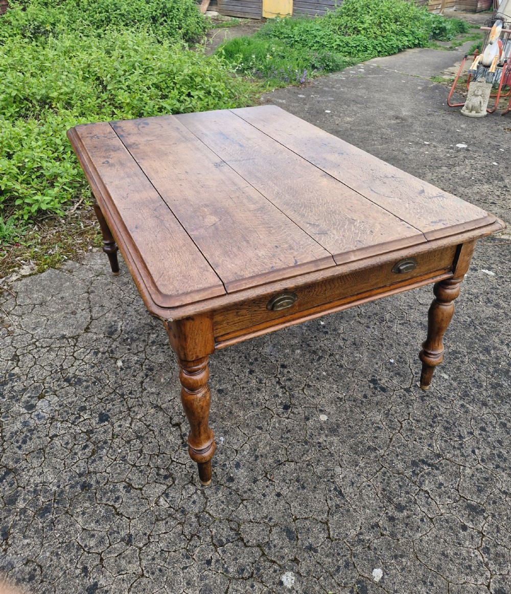 Late Victorian oak kitchen dining table. View XII