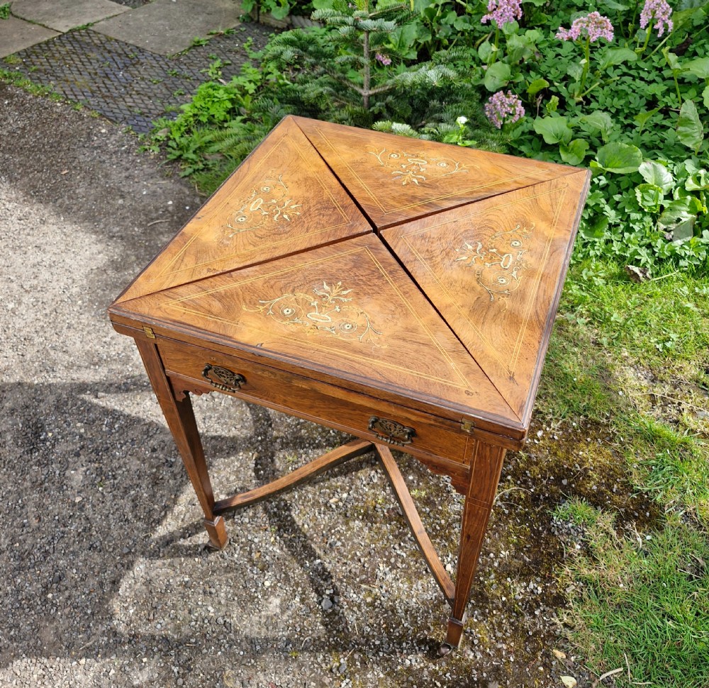 Late Victorian inlaid rosewood games table.