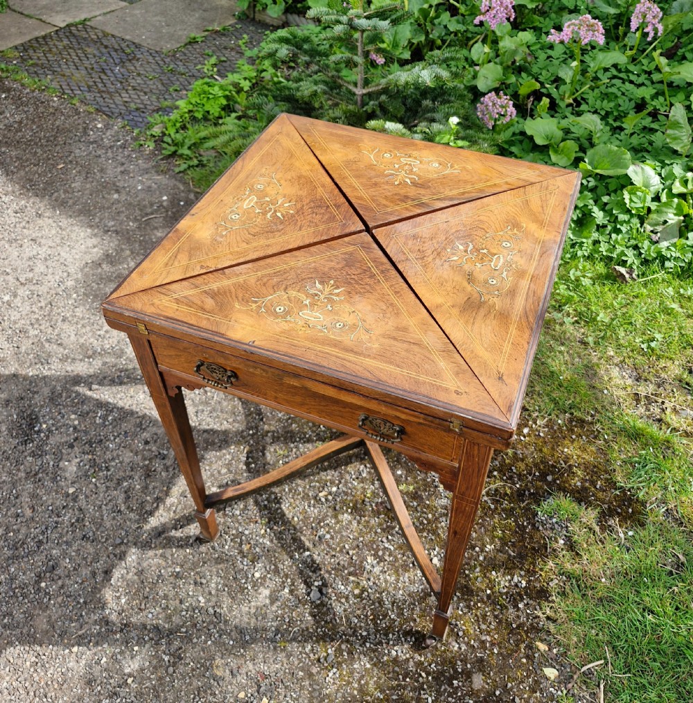 Late Victorian inlaid rosewood games table. View IX