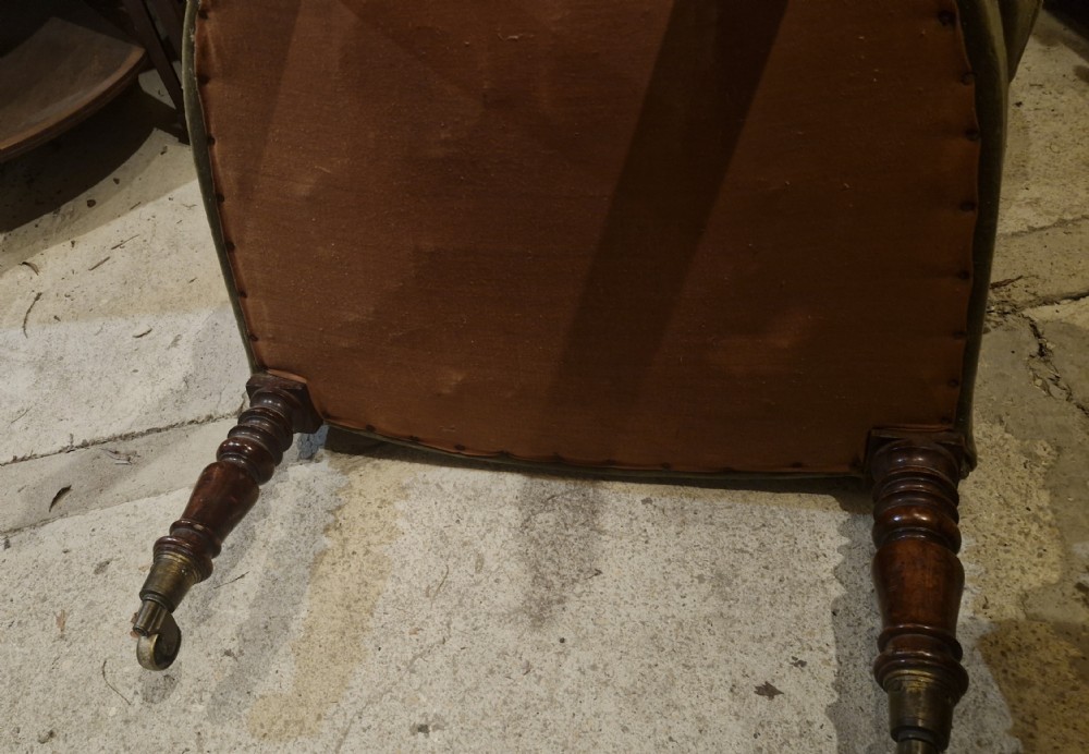 Regency mahogany upholstered wing barrel back armchair.  View VII