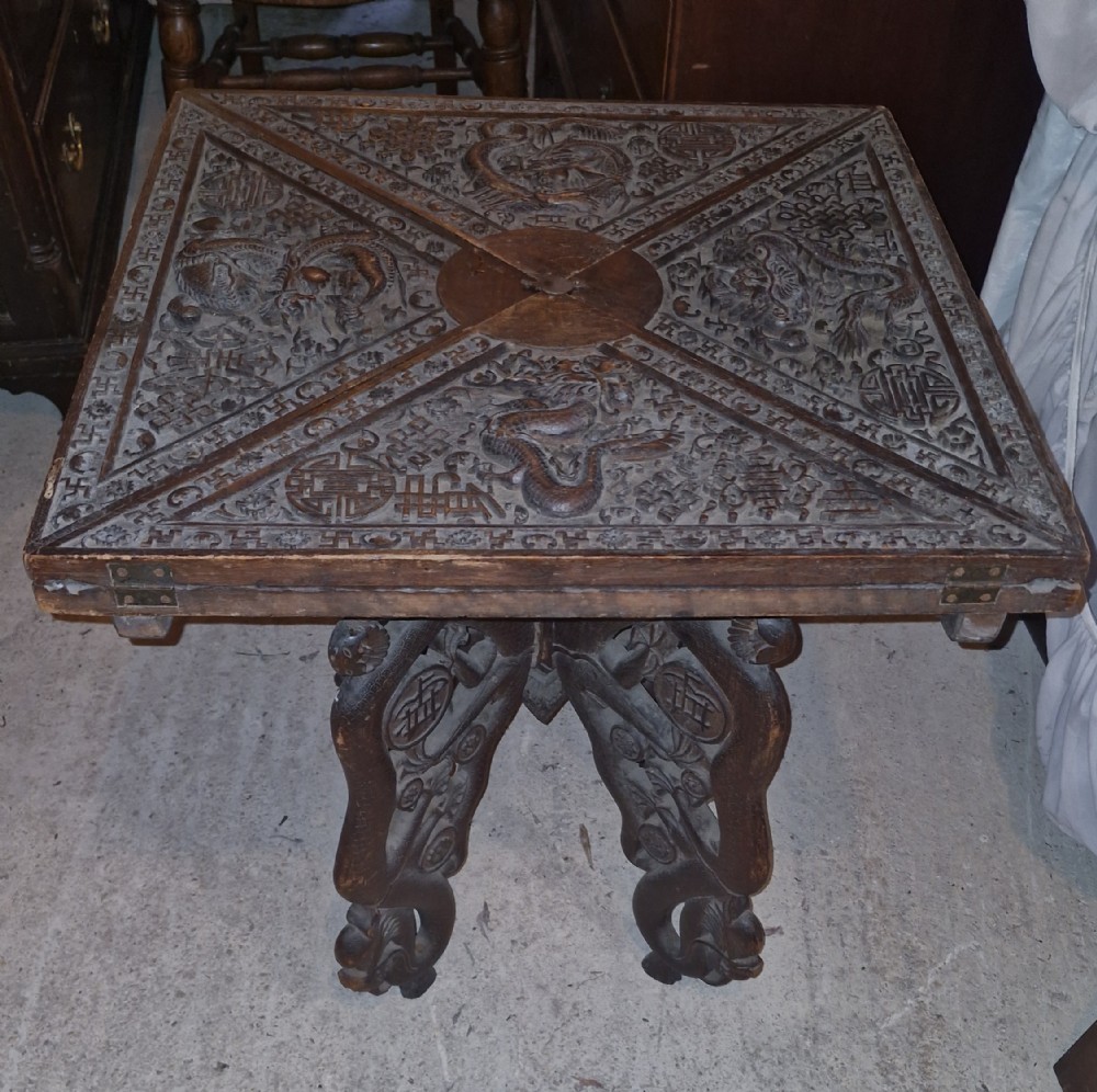 Oriental carved Envelope games table.