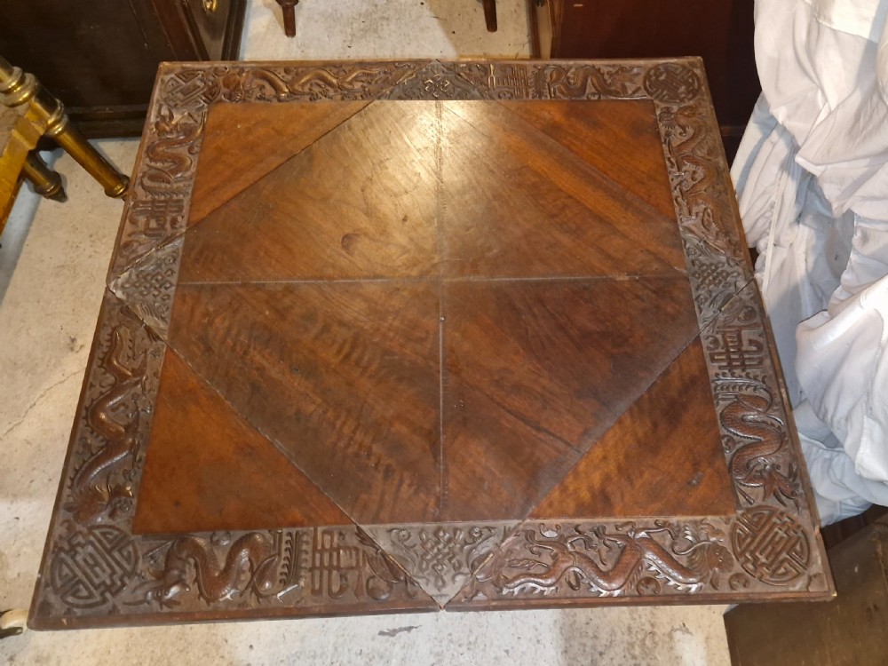 Oriental carved Envelope games table. View II